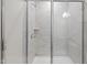 This glass shower features bright tile and silver hardware at 317 Highland Ridge Ln, Knightdale, NC 27545