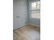 This bedroom features double closets, providing ample storage, and natural light from the window at 352 Faucette Mill Rd, Hillsborough, NC 27278