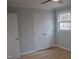 This bedroom has ample storage with double closets and natural light from a large window at 352 Faucette Mill Rd, Hillsborough, NC 27278