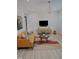 Cozy living room featuring modern decor, a patterned rug, and contemporary furniture at 352 Faucette Mill Rd, Hillsborough, NC 27278