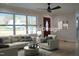 Stylishly decorated living room with modern furniture and abundant natural light at 352 Faucette Mill Rd, Hillsborough, NC 27278