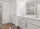 Bathroom with double vanity, modern fixtures, and a walk-in shower at 53 Lavender Ln, Clayton, NC 27520