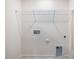 A basic laundry room space with a shelf and utility hookups at 53 Lavender Ln, Clayton, NC 27520