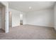 Spacious main bedroom with plush carpet, a walk-in closet, and an ensuite bathroom at 53 Lavender Ln, Clayton, NC 27520
