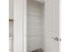 Walk-in pantry with white wire shelving at 53 Lavender Ln, Clayton, NC 27520