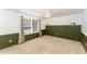 Bedroom with window and dark green wainscoting at 552 Stobhill Ln, Holly Springs, NC 27540