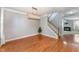 Hardwood floor dining room, with natural light and view to living room at 552 Stobhill Ln, Holly Springs, NC 27540