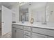 Modern bathroom with double sinks, a large mirror, and plenty of counter space at 60 Bennett Rd, Coats, NC 27521