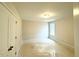 Bedroom with neutral walls, a window, and carpet flooring at 60 Bennett Rd, Coats, NC 27521