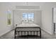 Bedroom featuring a comfortable bed and bright windows at 60 Bennett Rd, Coats, NC 27521