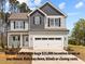 Charming two-story home featuring a modern exterior, a two-car garage, and well-maintained landscaping at 60 Bennett Rd, Coats, NC 27521