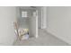 Hallway with grey carpet, white walls, and doors leading to different rooms on the second story at 60 Bennett Rd, Coats, NC 27521