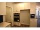 Well-appointed kitchen featuring stainless steel appliances, custom cabinets, and sleek design elements at 35 Accord Dr, Youngsville, NC 27596
