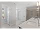 Large and bright bathroom with double sink vanity and walk-in shower at 35 Accord Dr, Youngsville, NC 27596