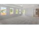 Spacious main bedroom with tray ceilings, walk-out balcony, and ensuite bathroom at 35 Accord Dr, Youngsville, NC 27596