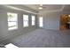 Spacious main bedroom with ensuite bathroom and outdoor access at 35 Accord Dr, Youngsville, NC 27596
