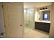 Beautiful bathroom with a glass shower and gray cabinets, creating a relaxing atmosphere at 55 Accord Dr, Youngsville, NC 27596