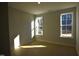 Bright bedroom with two windows, ideal for creating a cozy and comfortable space at 55 Accord Dr, Youngsville, NC 27596
