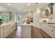 Beautiful kitchen features stainless steel appliances, island and hardwood floors at 55 Accord Dr, Youngsville, NC 27596