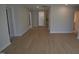 Spacious living room with hardwood floors and ample natural light, perfect for gatherings at 55 Accord Dr, Youngsville, NC 27596