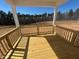 New wooden back deck and serene wooded backyard of home at 55 Calabria Ct, Franklinton, NC 27525