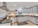 Bright kitchen with modern appliances, sleek countertops, and light wood flooring, perfect for cooking at 710 Spring Ln, Sanford, NC 27330