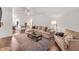 Inviting living room featuring a plush sectional sofa and stylish decor at 710 Spring Ln, Sanford, NC 27330