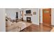 Inviting living room features a cozy fireplace, hardwood floors, and comfortable seating, perfect for relaxation at 710 Spring Ln, Sanford, NC 27330