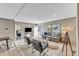 Spacious living area with comfortable seating, a view to the outdoors, and an open doorway to other rooms at 1235 Schloss Rd, Louisburg, NC 27549