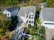 Aerial view of the home featuring mature trees and professional landscaping at 1509 Heritage Reserve Ct, Wake Forest, NC 27587