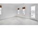 Bright bedroom with large windows and a glass door to the outside at 1509 Heritage Reserve Ct, Wake Forest, NC 27587