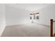 Bonus room with neutral carpet and multiple windows at 1509 Heritage Reserve Ct, Wake Forest, NC 27587