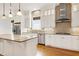Updated kitchen featuring stainless steel appliances, granite countertops, and modern cabinetry at 1509 Heritage Reserve Ct, Wake Forest, NC 27587