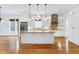 Spacious kitchen with granite countertops, stainless appliances, and custom cabinetry at 1509 Heritage Reserve Ct, Wake Forest, NC 27587