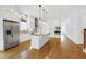 Elegant kitchen with stainless steel appliances, granite countertops, and ample cabinet space at 1509 Heritage Reserve Ct, Wake Forest, NC 27587