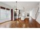 Gourmet kitchen featuring stainless steel appliances, wine rack, and granite countertops at 1509 Heritage Reserve Ct, Wake Forest, NC 27587