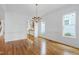 Open-concept living area showcases beautiful hardwood floors and bright natural light at 1509 Heritage Reserve Ct, Wake Forest, NC 27587