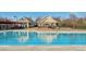 Outdoor swimming pool with bathhouse and ample deck space at 1509 Heritage Reserve Ct, Wake Forest, NC 27587