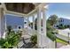 Covered porch with rocking chairs and a water feature at 1509 Heritage Reserve Ct, Wake Forest, NC 27587