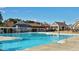 Large outdoor swimming pool and lounging area at 1509 Heritage Reserve Ct, Wake Forest, NC 27587
