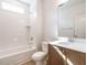 Clean bathroom featuring a shower-tub combo and a vanity with ample counter space at 201 Wash Hollow Dr, Wendell, NC 27591