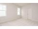 Cozy bedroom featuring plush carpet, natural light from windows, and neutral wall paint at 201 Wash Hollow Dr, Wendell, NC 27591