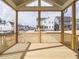 View from screened porch to neighboring homes and street at 201 Wash Hollow Dr, Wendell, NC 27591
