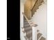 Elegant staircase with stained handrail and iron balusters; a sophisticated design element at 201 Wash Hollow Dr, Wendell, NC 27591
