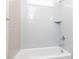 Close-up of a modern shower-tub combo with subway tile and chrome fixtures at 220 Big Bradley Dr, Wendell, NC 27591