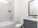 Stylish bathroom featuring a shower-tub combo with gray subway tile and a granite-topped vanity at 220 Big Bradley Dr, Wendell, NC 27591