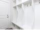 This well-organized mudroom offers storage with coat hooks, shelving, and seating, conveniently located near the entrance at 220 Big Bradley Dr, Wendell, NC 27591