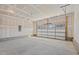 Spacious garage with concrete floor and overhead door at 1050 Parkside Drive, Nashville, NC 27856
