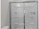 Clean shower with glass enclosure and built-in shelving at 1050 Parkside Drive, Nashville, NC 27856
