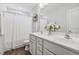 Modern bathroom features a double sink vanity, decorative mirror, and shower with curtain at 232 Big Barn Dr, Wendell, NC 27591